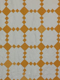 Crisp and clean two-coloured quilt - cheddar and white