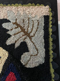 'Sad Dog' hooked rug
