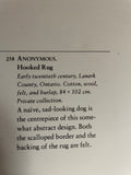 'Sad Dog' hooked rug