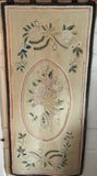 Floral hooked rug in pastel shade of colour