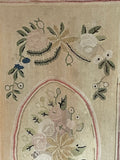 Floral hooked rug in pastel shade of colour