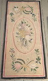 Floral hooked rug in pastel shade of colour