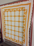 Crisp and clean two-coloured quilt - cheddar and white