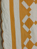 Crisp and clean two-coloured quilt - cheddar and white