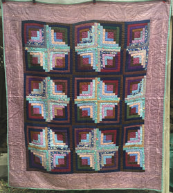 Sunshine and Shadow Log Cabin Quilt