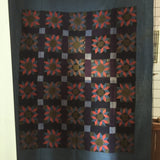 Amish Carpenter's Wheel Quilt
