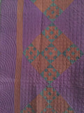 Amish Hole-in-the-Barn-Door or Churn Dash Quilt