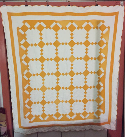 Crisp and clean two-coloured quilt - cheddar and white