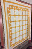 Crisp and clean two-coloured quilt - cheddar and white